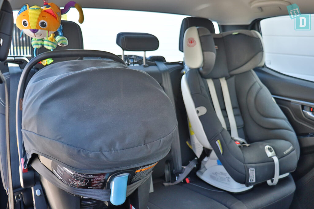 Isuzu D-Max 2021 with rear facing infant capsule and forward facing child seat installed