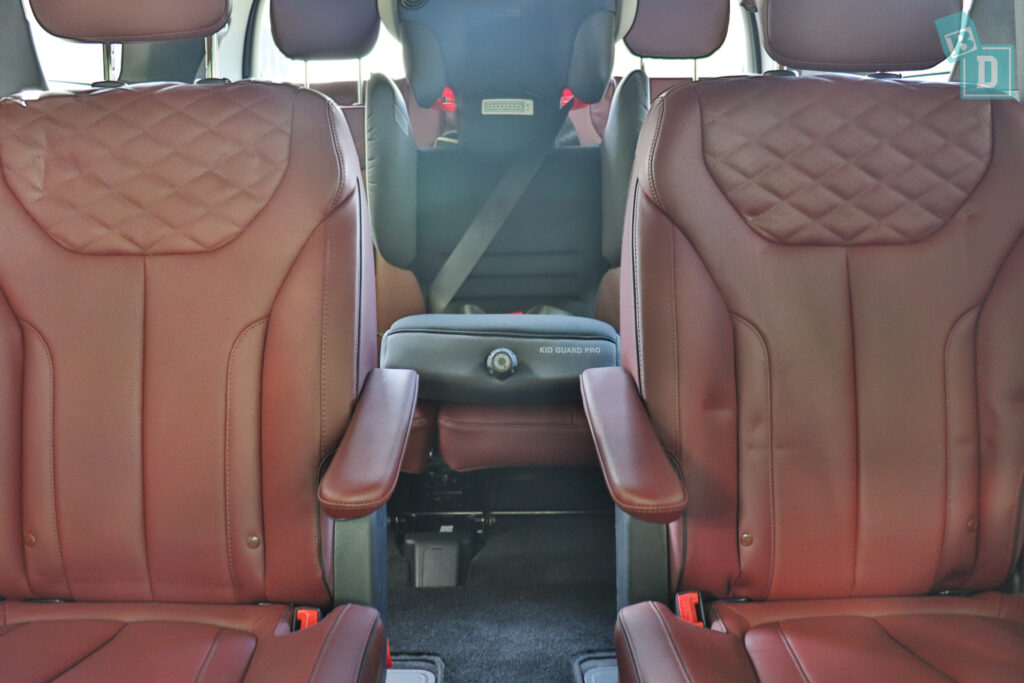 2021 Hyundai Palisade Highlander with child seat installed in third row central position