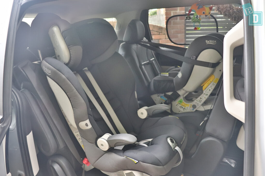 2021 Kia Carnival legroom with forward-facing child seats installed in the second row