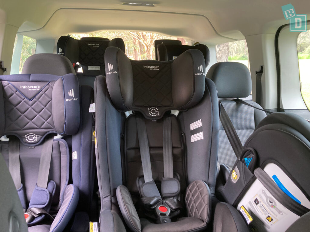 2022 VW Caddy People Mover with three child seats installed in the second row