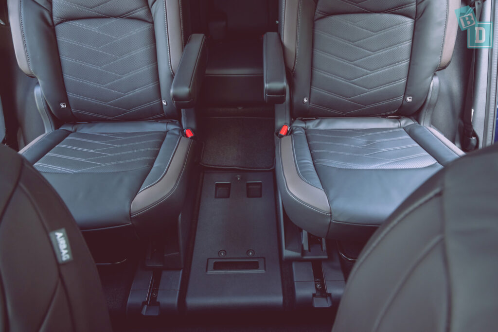 2023 Nissan Pathfinder walk through second row with captains chairs