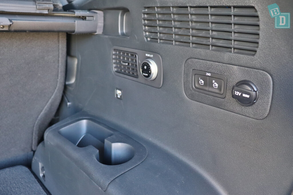 the interior of a car with a radio and controls.