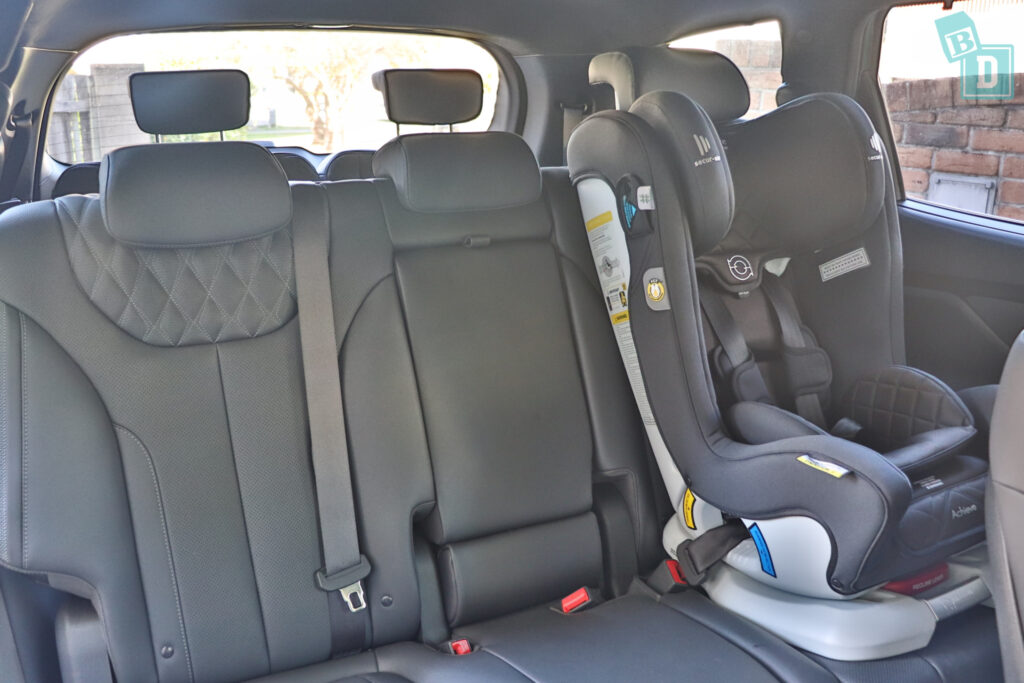 the back seat of a 2023 Hyundai Santa Fe Hybrid second-row with a child seat in it.