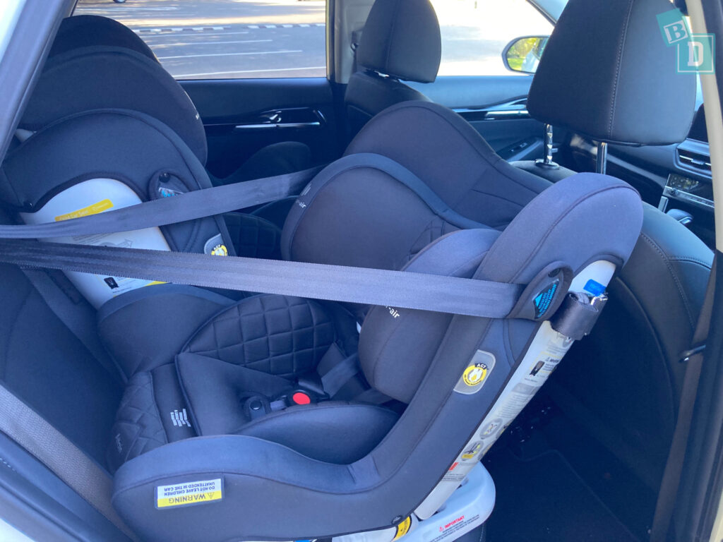 legroom with rear-facing child seat fitted in the back seat of a 2023 Kia Seltos