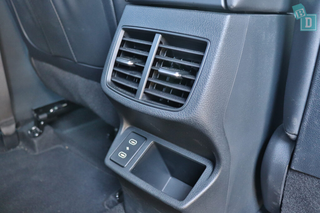 the interior of a car with an air conditioning unit.