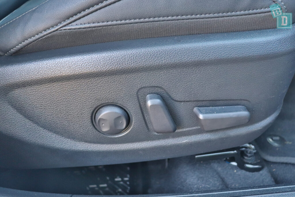 a close up of the door handle of a car.
