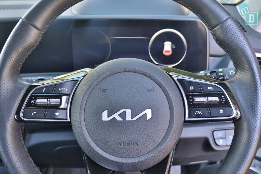 the steering wheel of a kia sportage.