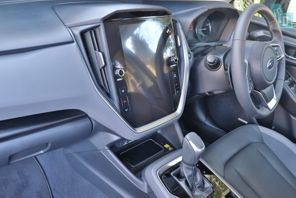 the interior of a car with a dashboard and steering wheel.