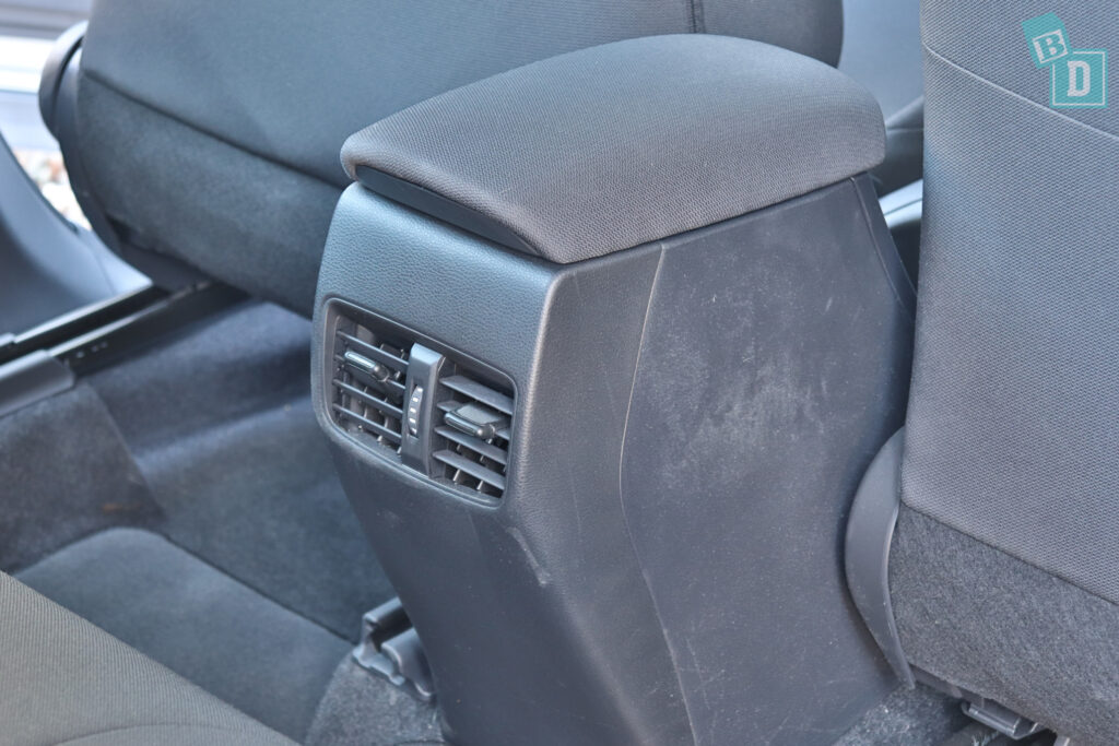the back seat of a car with an air conditioning unit.