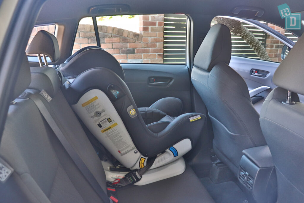 legroom with a baby car seat in the back seat of a 2023 Toyota Corolla Cross hybrid