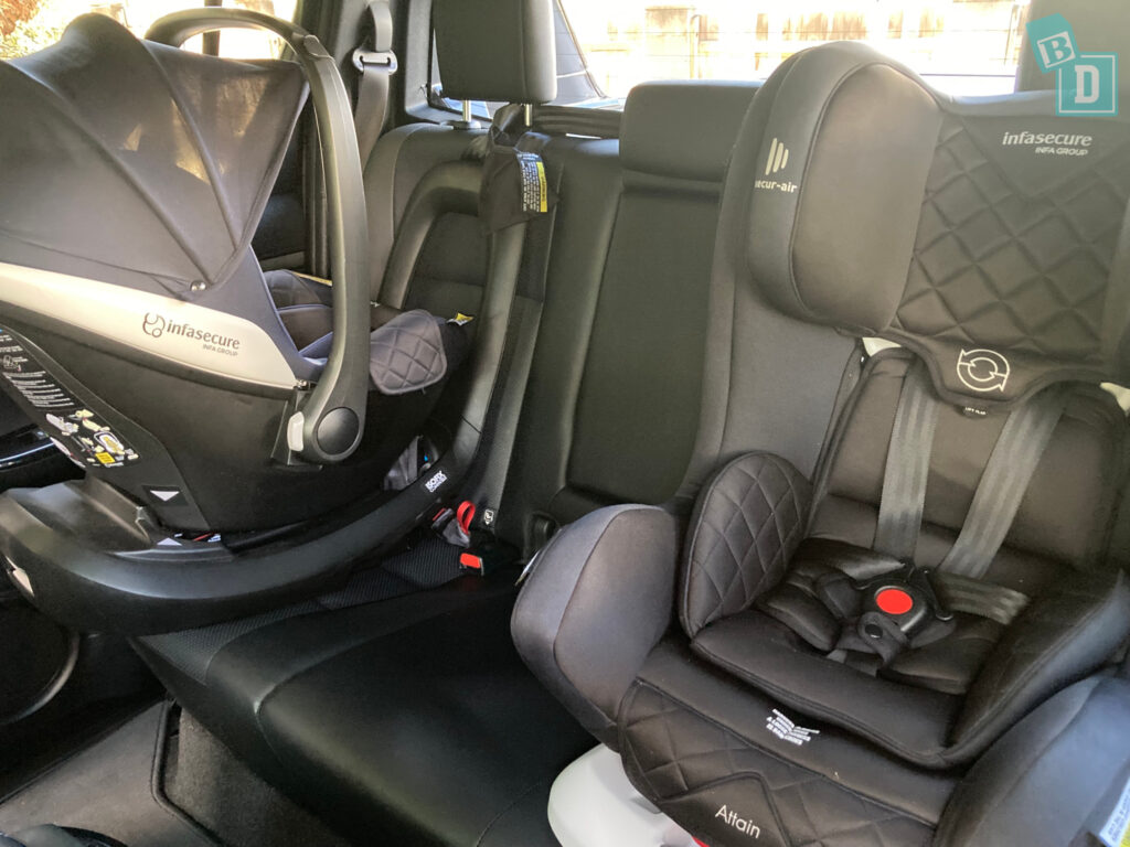 2 child seats in the back of a 2023 Toyota HiLux Rogue