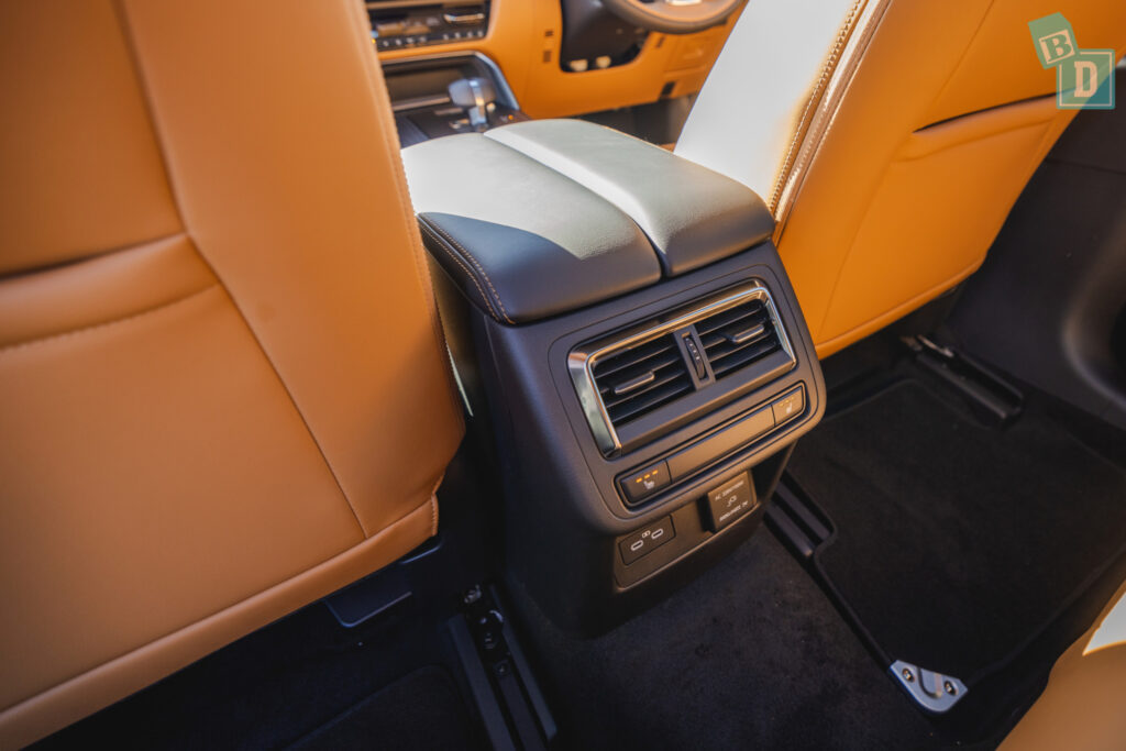 the interior of a car with tan leather seats.