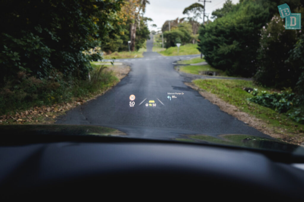 an image of a car driving down a road.