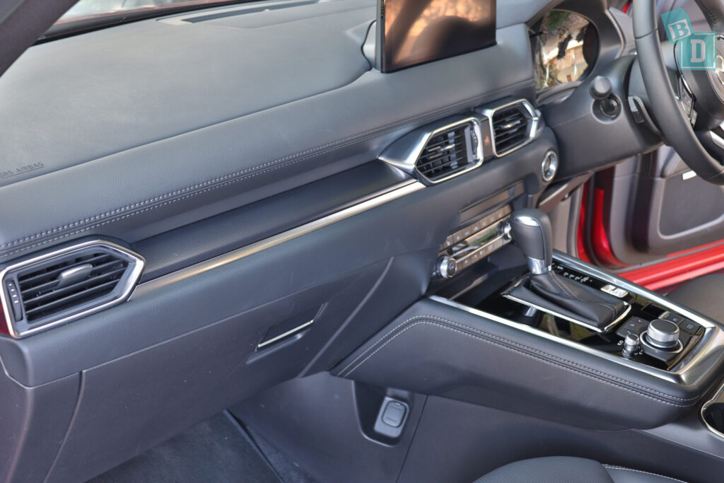 The dashboard and steering wheel of a car.