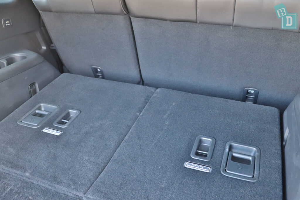 The back seat of a 2023 Mazda CX-8 with two seats and a console.