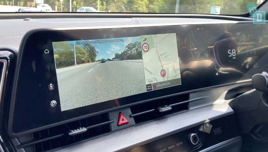 The dashboard of a car with a gps screen.