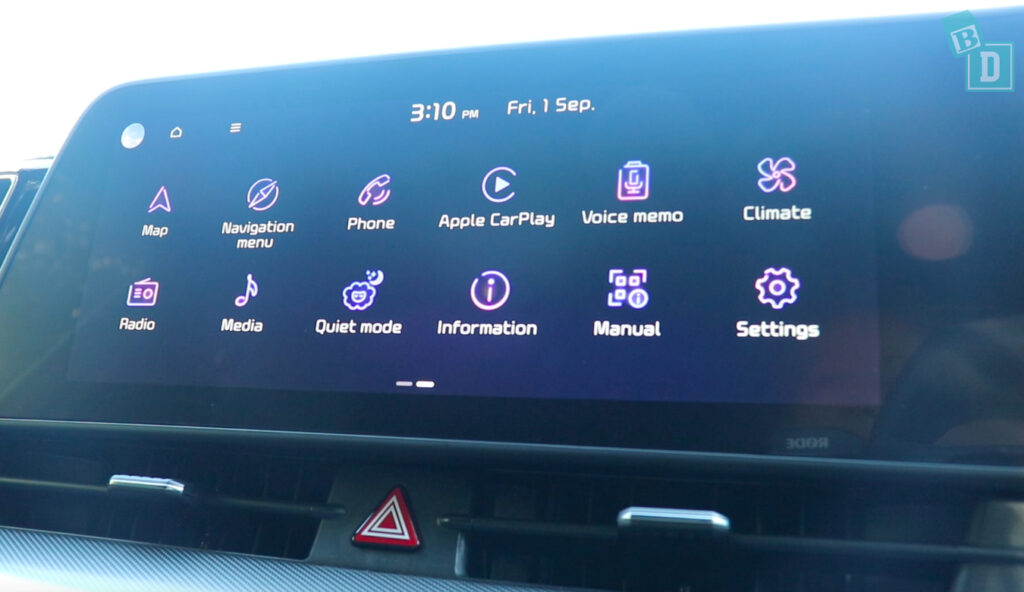 The dashboard of a car with a lot of buttons on it.