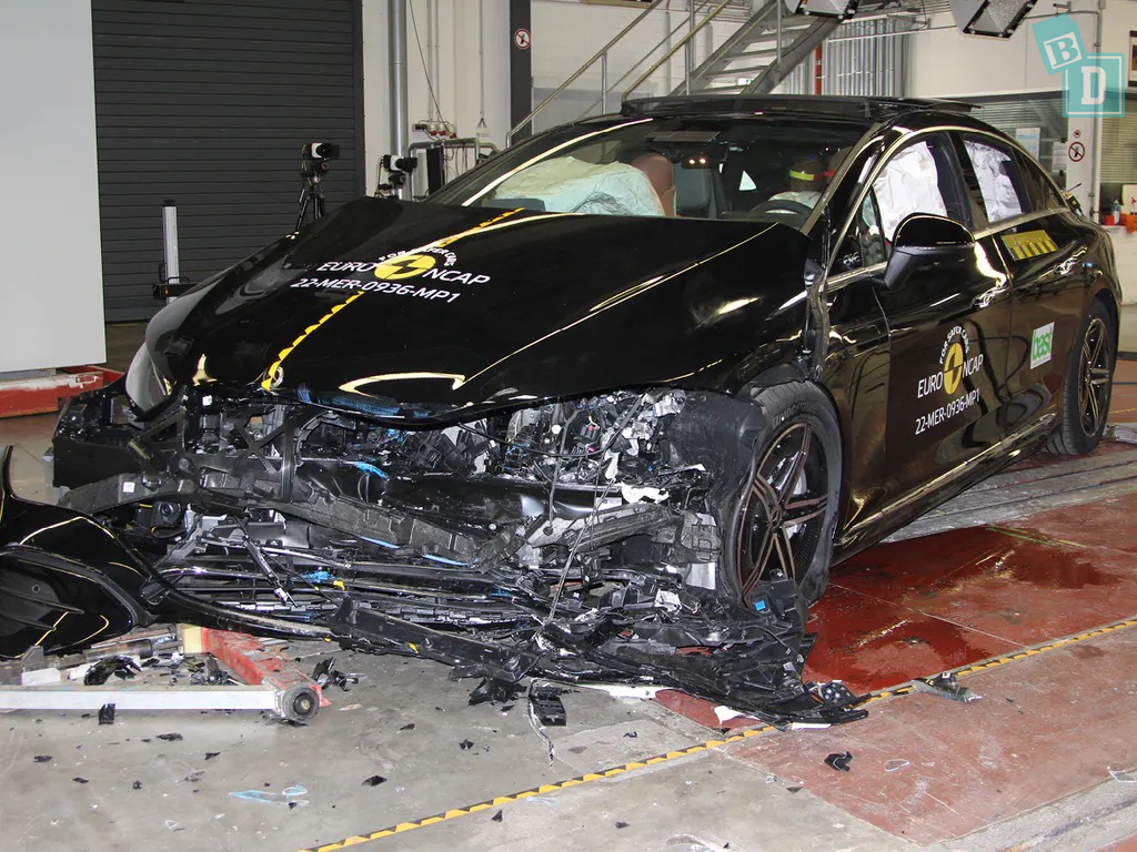 A black car in a crash test.