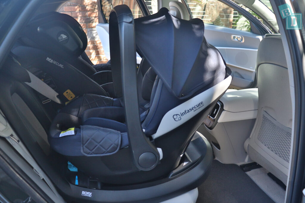 A child seat in the back seat of a 2023 Hyundai Ioniq 6.