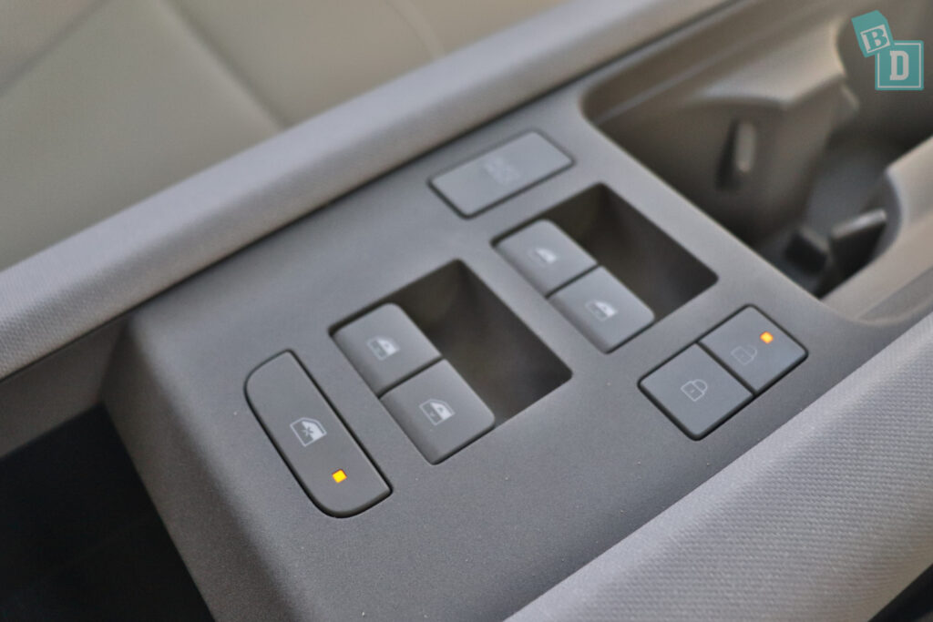 The control panel of a car with buttons on it.