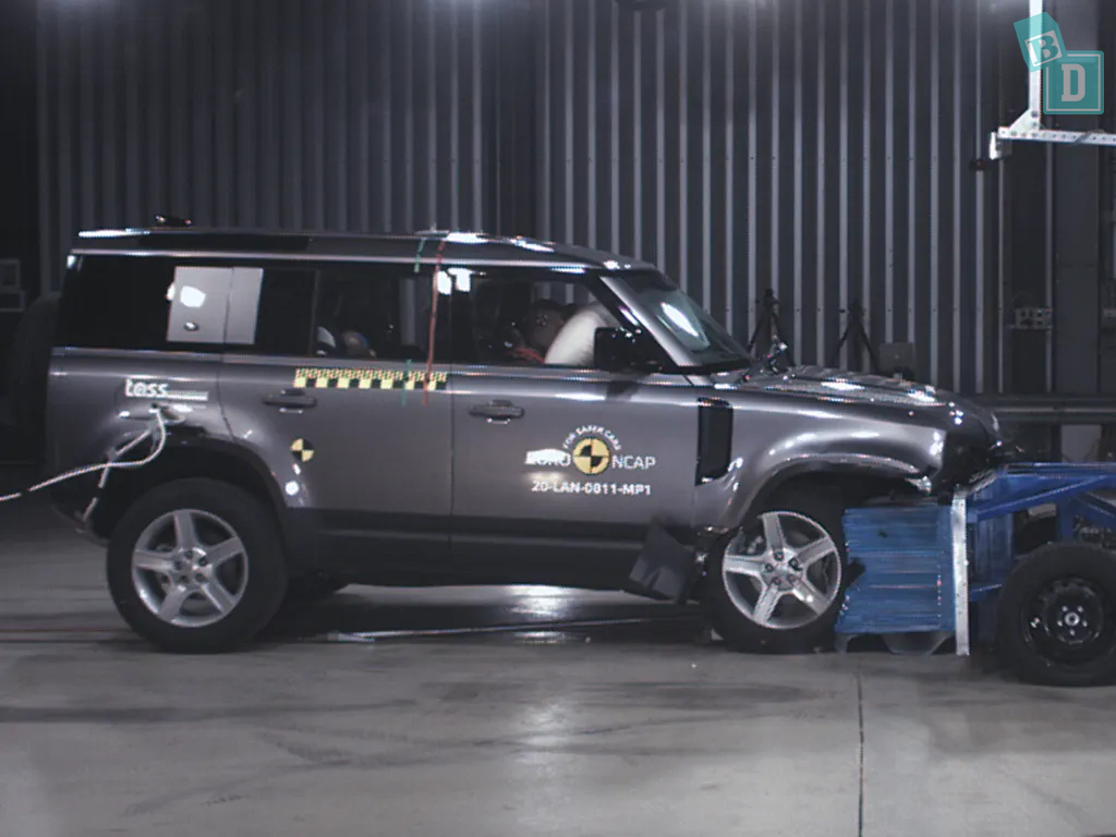 A land rover is being tested in a crash test.