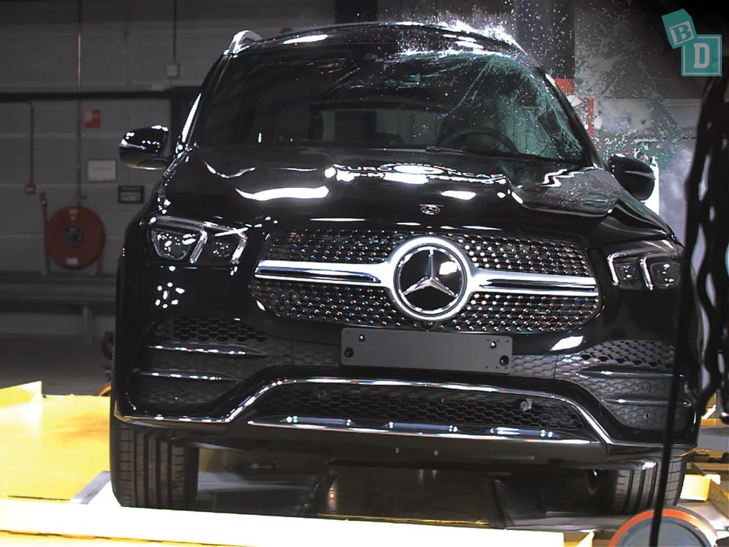 The mercedes benz gle is being tested in a garage.