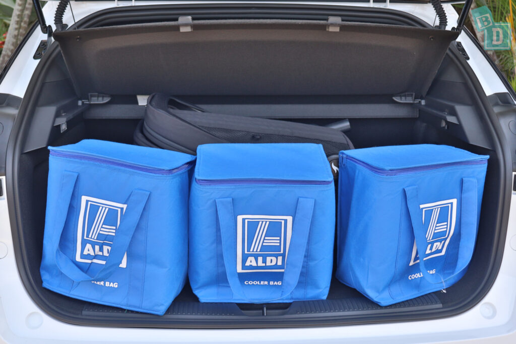Three blue bags in the trunk of a 2023 MG4.