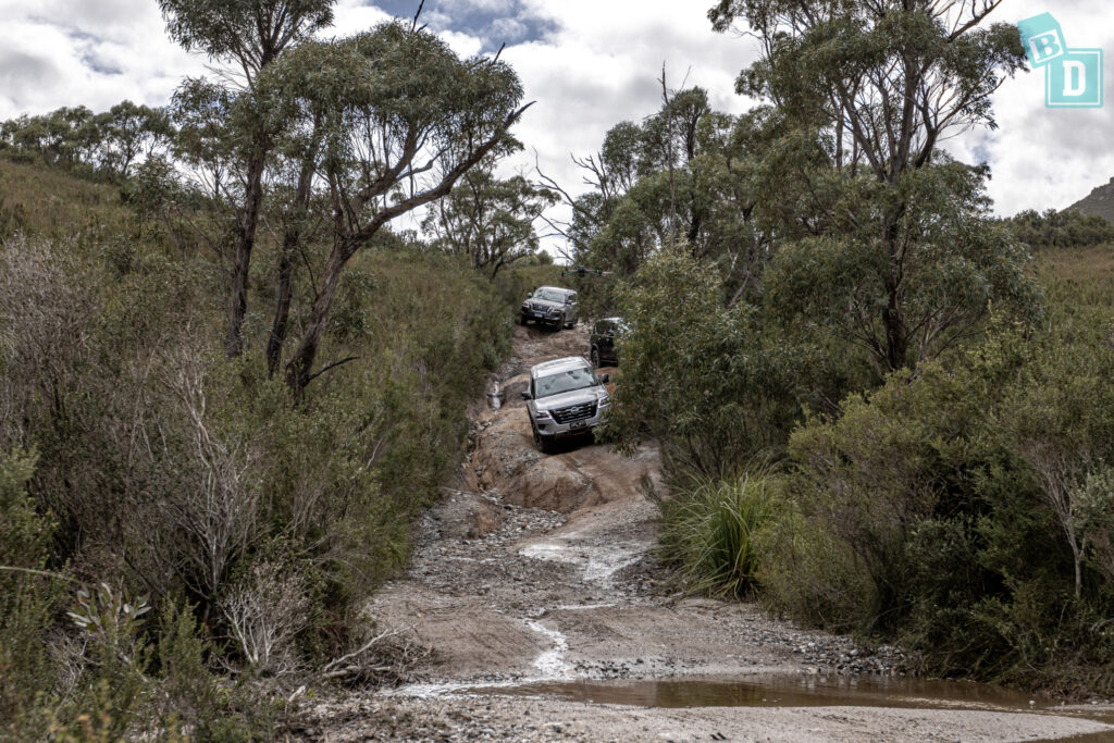 Two 2023 Nissan Patrol Warrior 4x4 off-roading in Tasmania
