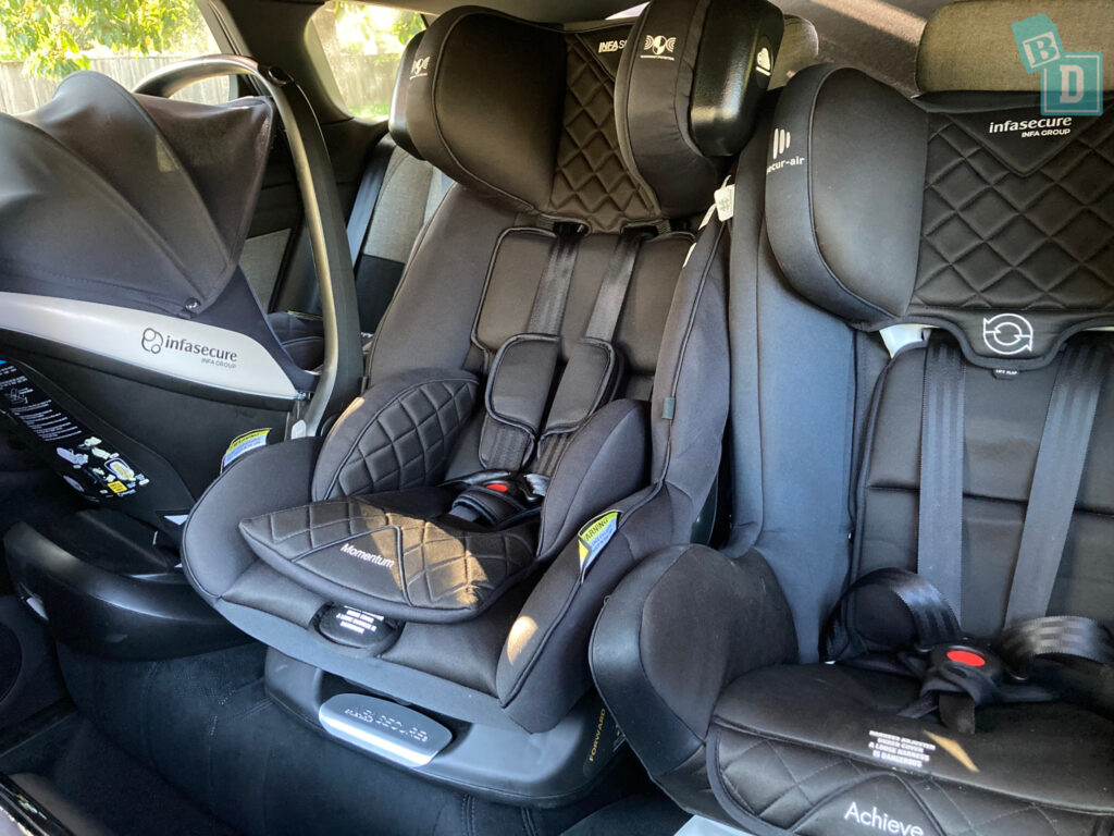 2023 Range Rover Evoque PHEV with three child seats installed in the second row 