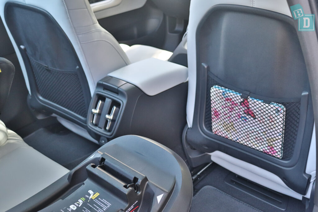 2024 Polestar 2 legroom with forward-facing child seats installed in the second row
