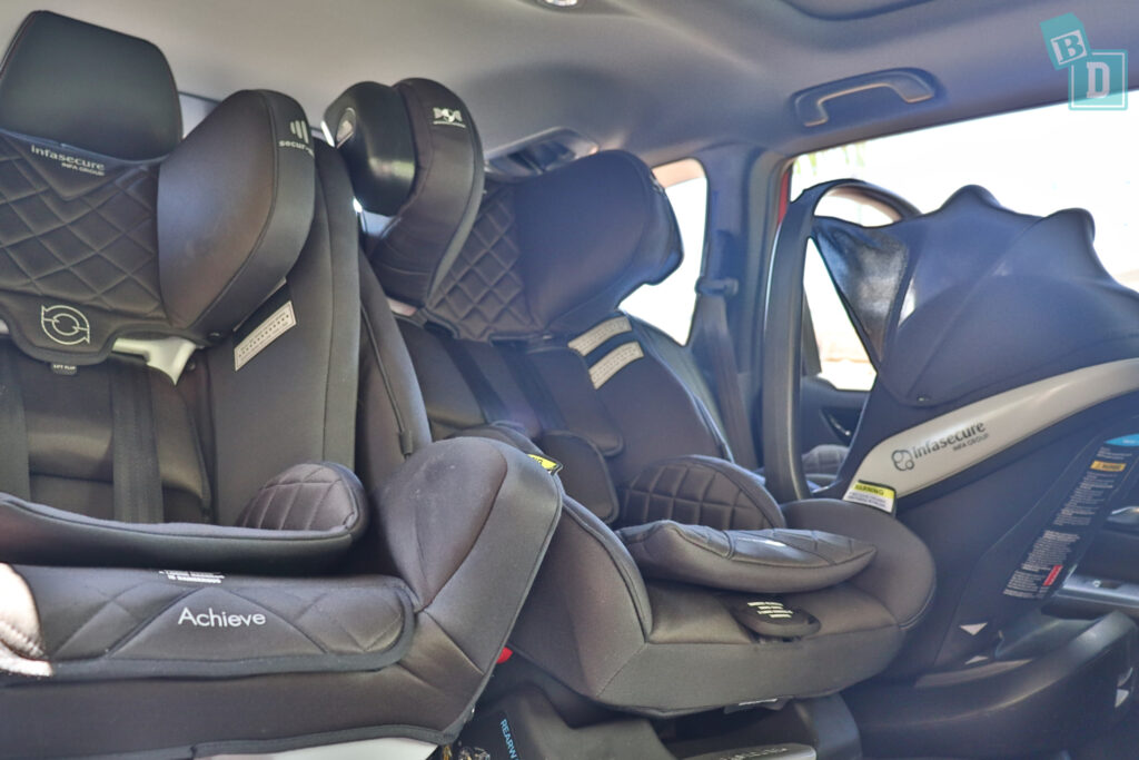 2024 Honda Civic Hybrid RS e:HEV with three child seats installed in the second row
