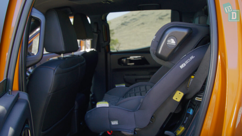 2024 Mitsubishi Triton legroom with forward-facing child seats installed in the second row 
