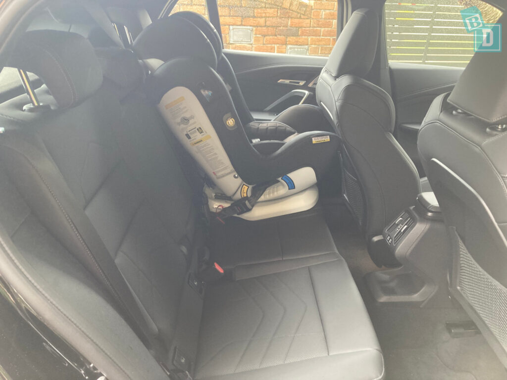 2024 BMW X2 XDrive 20i legroom with forward-facing child seats installed in the second row
