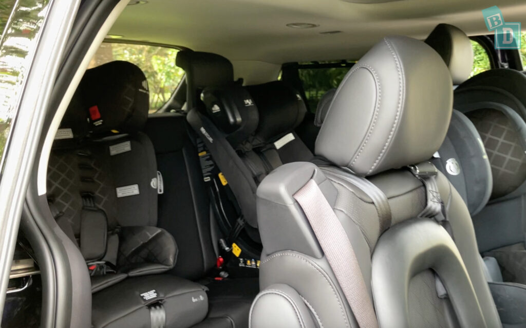 2025 Kia Carnival GT-Line Hybrid access to the third row with child seats installed in the second row 